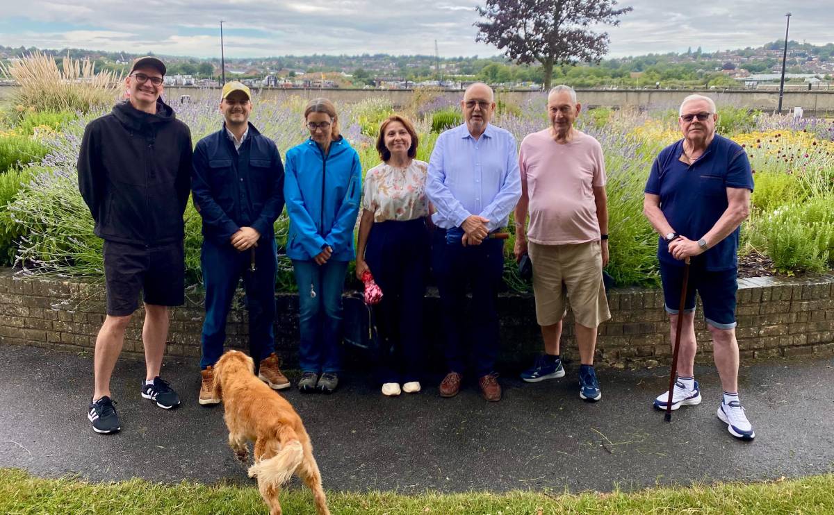 Some of FoRCE's volunteers (and a dog) with the RHS assessor in the Suffrage Sensory Garden