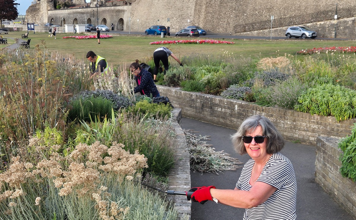 Volunteers maintaining the sensory garden